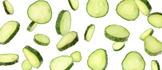 Fresh cucumber slices in air on white background. Banner design