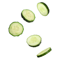 Fresh cucumber slices in air on white background