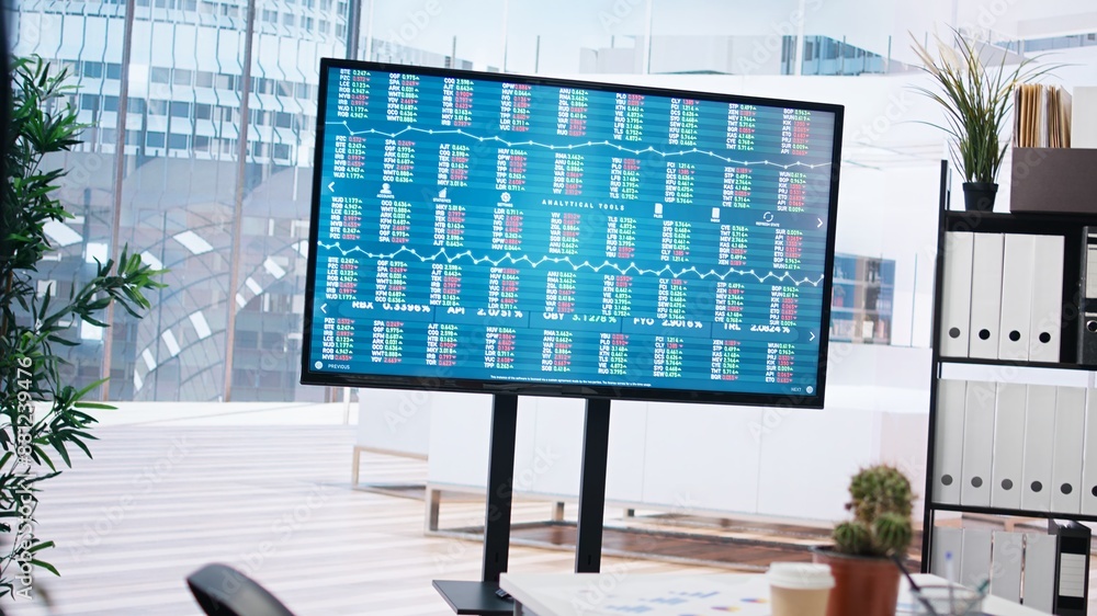 Poster big screen in financial department office shows stock exchange indices changing in real time. displa