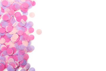 Colorful purple confetti on white background. Top view