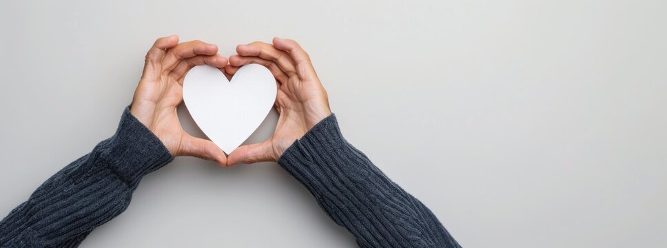 Customer making a heart shape with hands, blank space for rating, natural lighting
