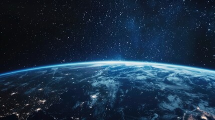 A photo of the Earth taken from space at night, showing the globe's curvature and city lights