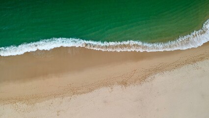 Aerial view of waves crashing on a beach