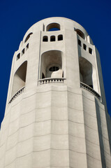 Coit Tower against a blue sky.