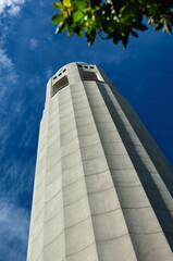 Coit Tower against a blue sky.