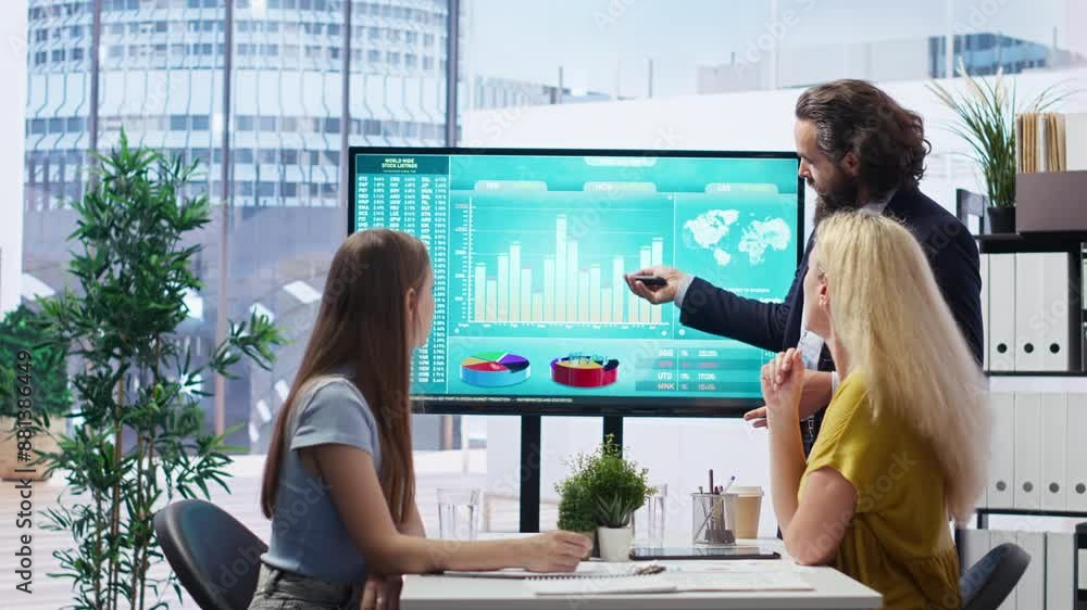 Poster financial adviser presents market analytics to customers using large display, emphasizing data drive