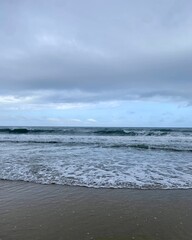 A stormy beach and sky