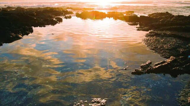 Sunset Reflections on Tide Pools on Giada's Beach, Hawaii Island, Hawaii, USA