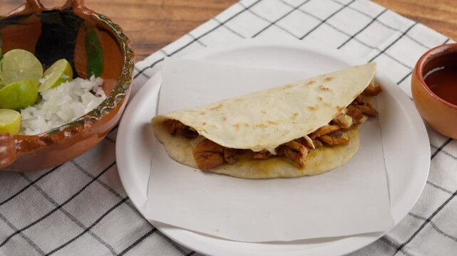 Traditional food from mexico, pork meat and cheese, Gringa al pastor, Pan right