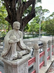 Obraz premium buddha statue in the park