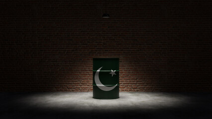 Oil barrel with the flag of Pakistan in front of a brick background
