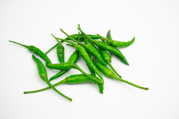 Green cayenne peppers in clusters. isolated on white background.