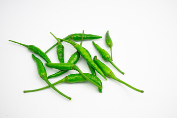 Green cayenne peppers in clusters. isolated on white background.