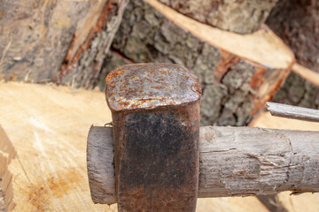 Flat side of a wood cutting axe, abstract texture, backdrop
