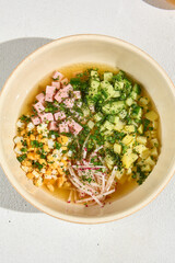 Traditional Russian Okroshka with Kvass in Ceramic Bowl - Fresh Summer Soup