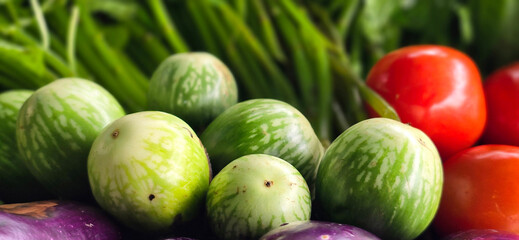 assortment of fresh organic vegetables and fruits in colorful arrangement , good for cooking multimedia creative content creation