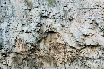 rough cliff, stone wall