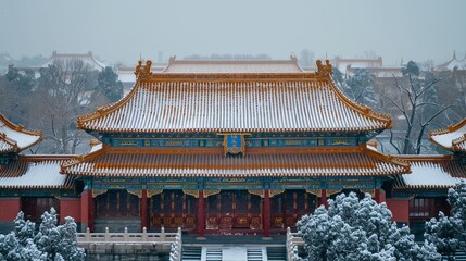 Naklejka premium A picturesque winter scene of the Forbidden City in Beijing, featuring a plaque on a building displaying the palace's name.