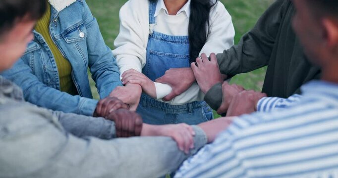 Teamwork, support and people holding arms for community, connection or diversity goals. Unity, collaboration and group of volunteers link together for solidarity, partnership or synergy in nature.