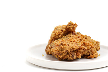 Crispy and crunchy fried chicken isolated on white background. perfect for photo illustration, design element, or any commercial purposes.