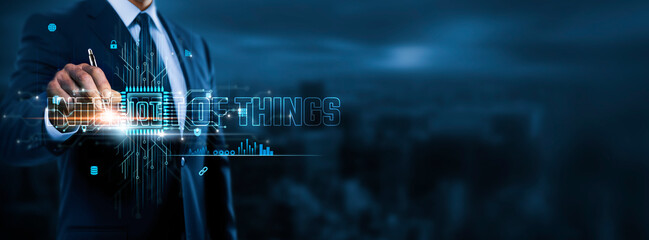 IoT: Connectivity, Automation, Efficiency, Businessman Touch of Icons Enabling Data Exchange on Business Network Connection, Real-Time Monitoring, Analytics, Business and Smart Technology.