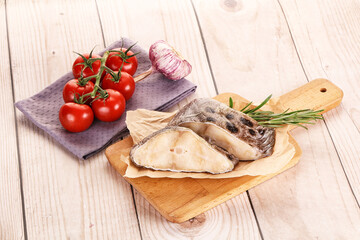 Raw wolffish steak for cooking