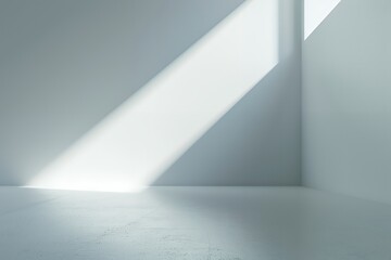 Obraz premium A corner of an empty white wall with a beam of light shining on it, creating a sense of space and depth. The background is pure gray. A white color scheme with a minimalist style and a studio lighting