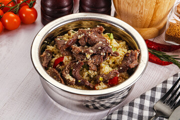 Traditional couscous with beef and vegetables