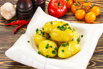 Boiled young potato with green onion