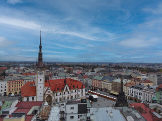 Fototapeta premium Olomouc, Czech Republic April 20, 2022: Top view of the Old town, town hall and Holy Trinity Column in Olomouc, Czech Republic