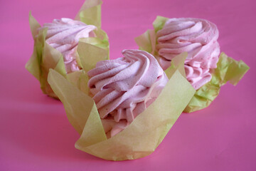 Pink colored meringue cookies, Zefir, Zephyr. A gift of zephyrs. Top view.