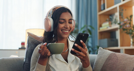 Headphones, indian woman and cellphone for social media in home, laugh and music in living room....