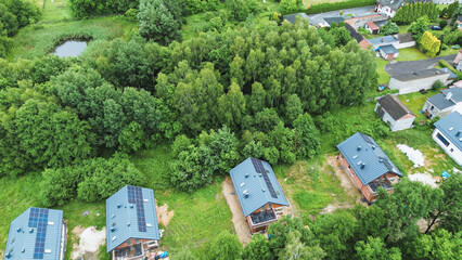 Aerial View of Modern House with Solar Panels