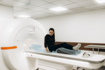 Patient undergoing mri scan at hospital.