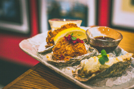 fried oysters including KAKI FRY made from oyster panko, egg mayo & lemon, OYSTER FRITTO with battered oyster & yuzu kosho mayo, CREAM KOROKKE with bechamel, chuno sauce & shibazuke.