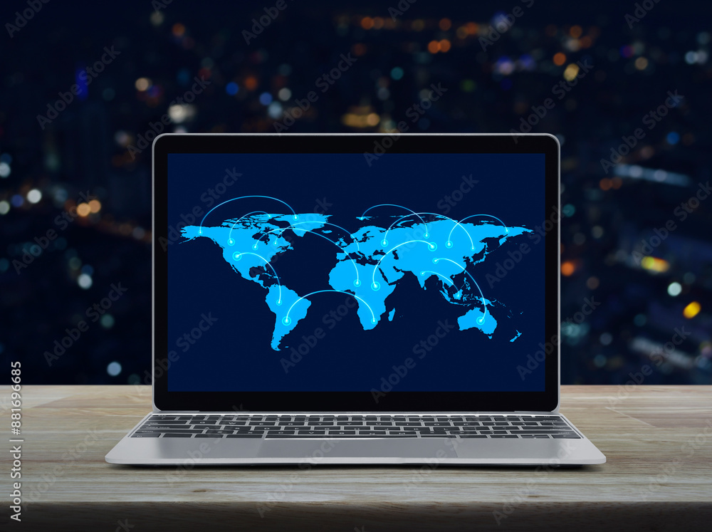 Aufkleber connection line with global world map on laptop computer monitor screen on table over blur night cit