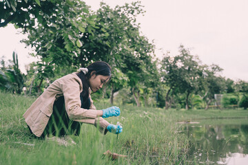 In our biology research, we used a tube to collect water samples for chemical analysis and testing, crucial for understanding aquatic ecosystems.