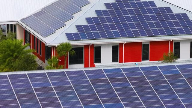 Photovoltaic panels on solar rooftops of Florida commercial buildings for producing clean ecological electrical energy. Renewable electricity with zero emission concept