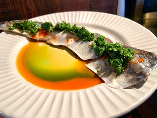 Mackerel boquerones with lemon juice and olive oil, herbs
