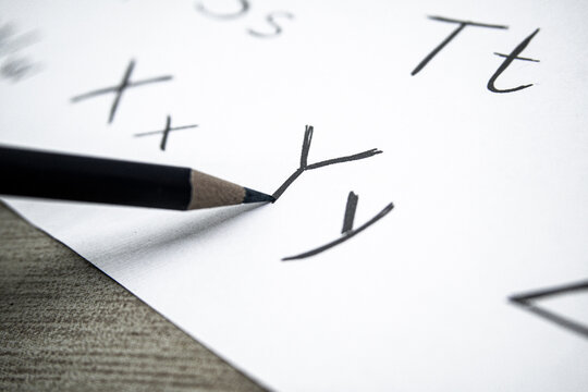 PENCIL AND ALPHABET LETTER Y