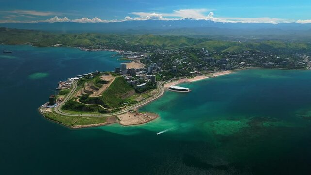 Ela Beach point boat Port Moresby APEC Haus Convention center Capital City Central Business District aerial drone Papua New Guinea PNG traffic Idlers Bay Hilton Marriot Crowne Plaza circle left motion