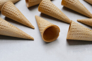 Waffle cones on grey background