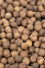 Macro photography of black peppercorns, hot spice