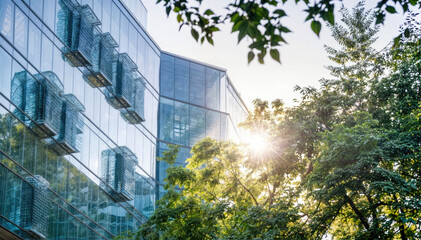 Modern Glass Office Building Amid Lush Greenery