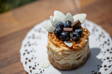 Piece of delicious cheesecake with caramel 
