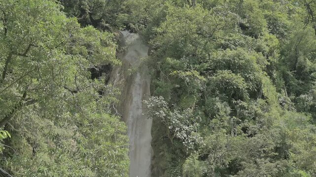 Waterfall falling from cliff in mountains, Neer Waterfall, Rishikesh, Uttarakhand, India, Himalayas 