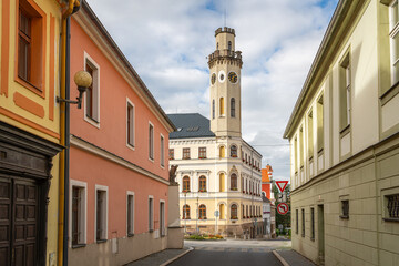 Fototapeta premium Cityscape of Klasterec nad Ohri, view of the main square with the historical town hall tower