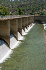 Fototapeta premium water released from hydroelectric power station. Motion Blur and selective focus