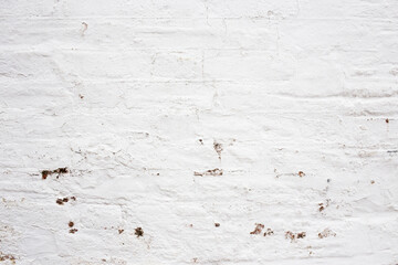 Vintage shabby chic white painted brick wall background 