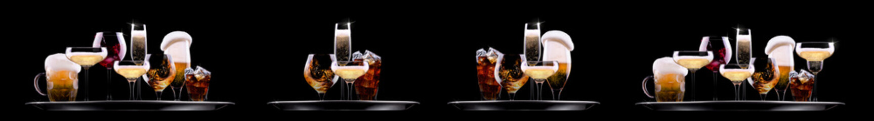 Hand holding tray with different alcohol cocktails isolated on black background